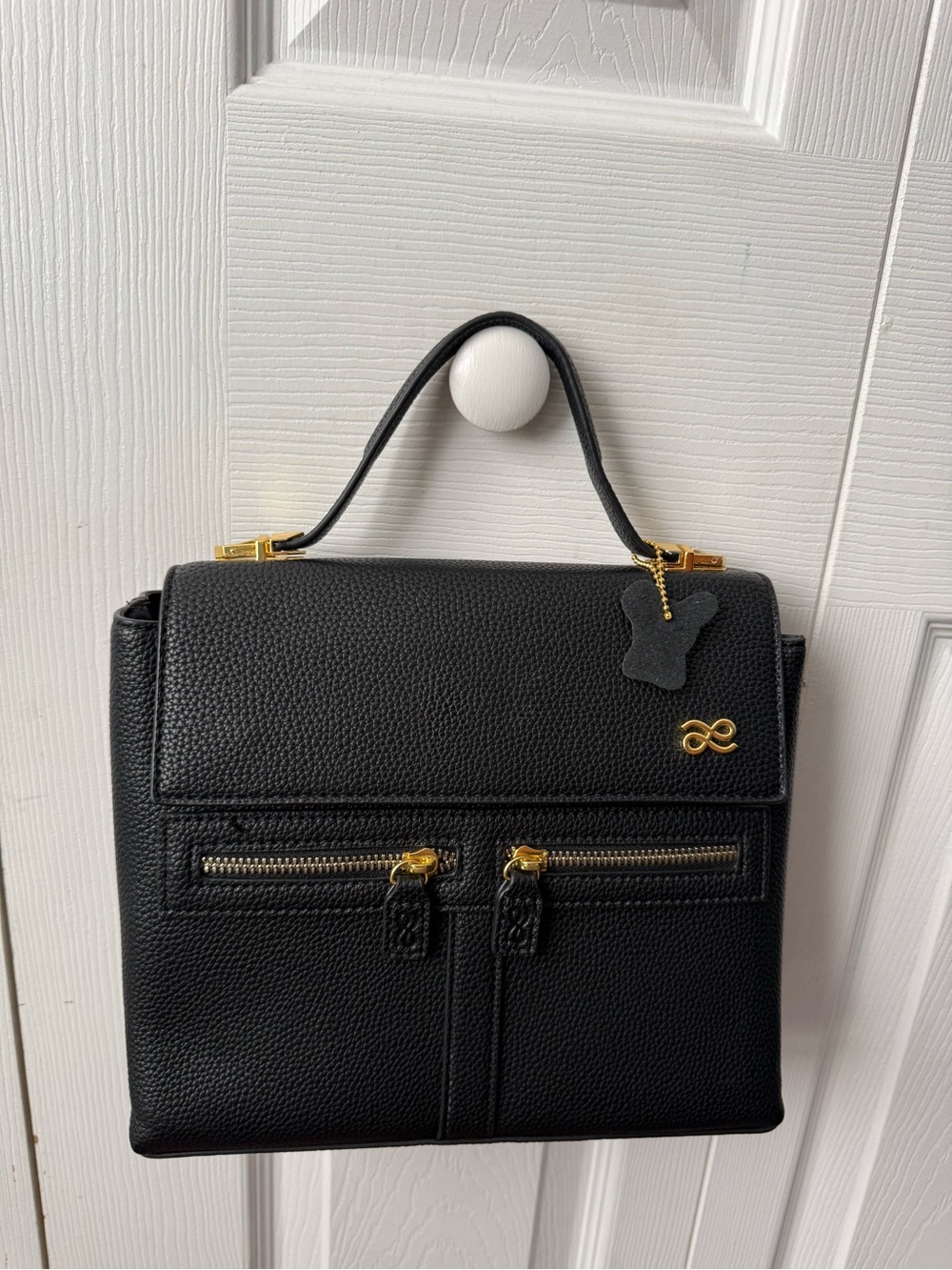 Black Leather Shoulder Bag with Gold Accents